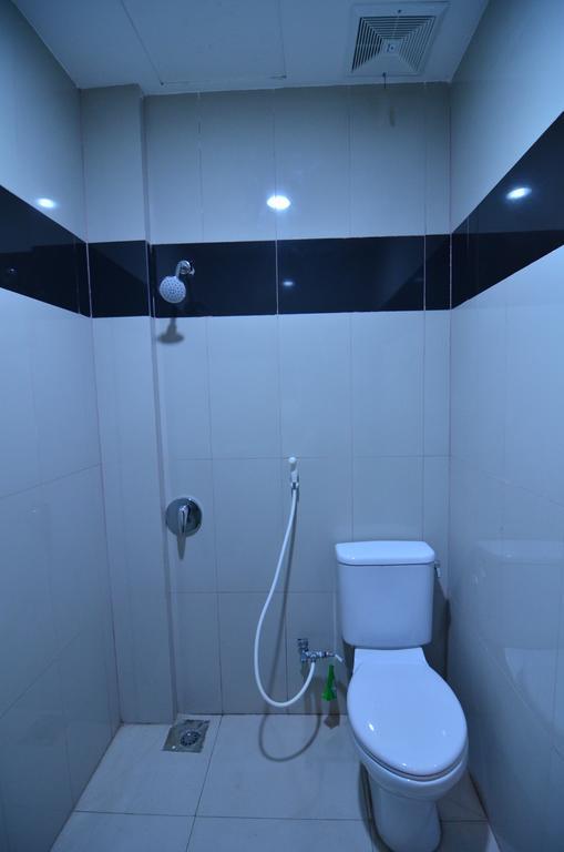 Galaxy Inn Baubau Zimmer foto